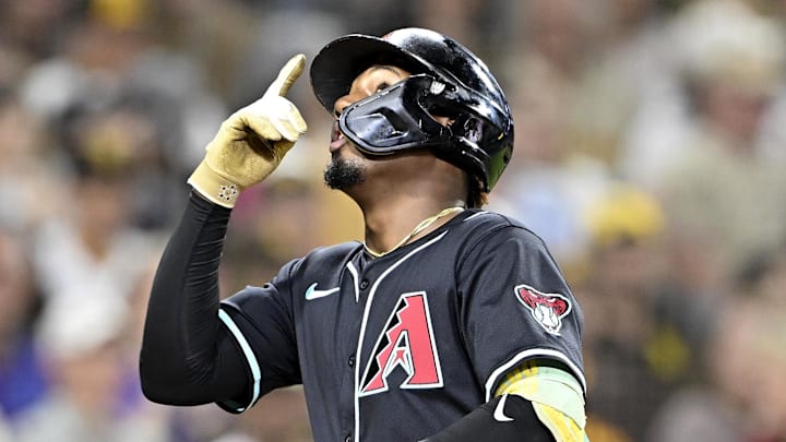 Sep 27, 2025; San Diego, California, USA; Arizona Diamondbacks shortstop Geraldo Perdomo (2) points skyward after hitting a solo home run during the fifth inning against the San Diego Padres at Petco Park. Mandatory Credit: Denis Poroy-Imagn Images