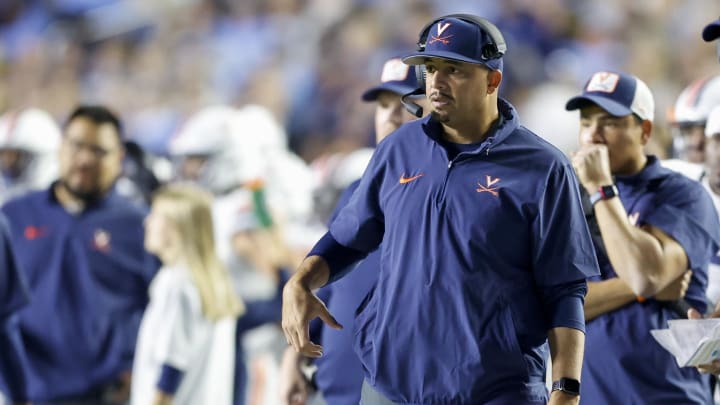 Oct 21, 2023; Chapel Hill, North Carolina, USA;  Virginia Cavaliers head coach Tony Elliott watches his team play against the North Carolina Tar Heels in the first half at Kenan Memorial Stadium. Mandatory Credit: Nell Redmond-USA TODAY Sports