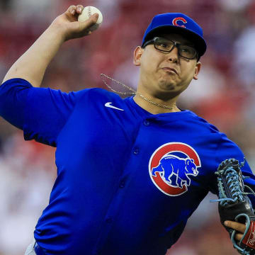 Jun 6, 2024; Cincinnati, Ohio, USA; Chicago Cubs starting pitcher Javier Assad (72) pitches against the Cincinnati Reds in the sixth inning at Great American Ball Park.