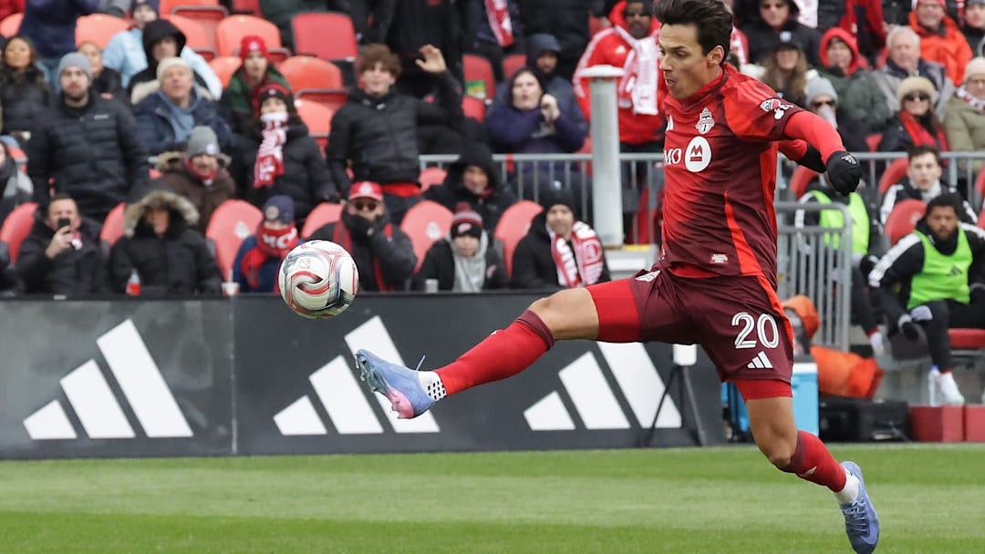 Daniel Salloi chips the ball over NYRB keeper Ethan Horvath to open the scoring.