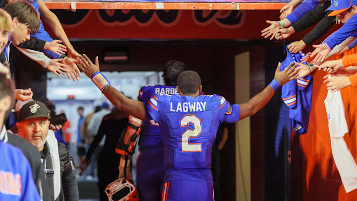 Florida quarterback DJ Lagway (2) leaves the field after beating Florida State 40-21 during an NCAA football game at Steve Spurrier Field at Ben Hill Griffin Stadium in Gainesville, FL on Saturday, November 29, Florida beat Florida State 40-21.2025. [Alan Youngblood/Gainesville Sun]