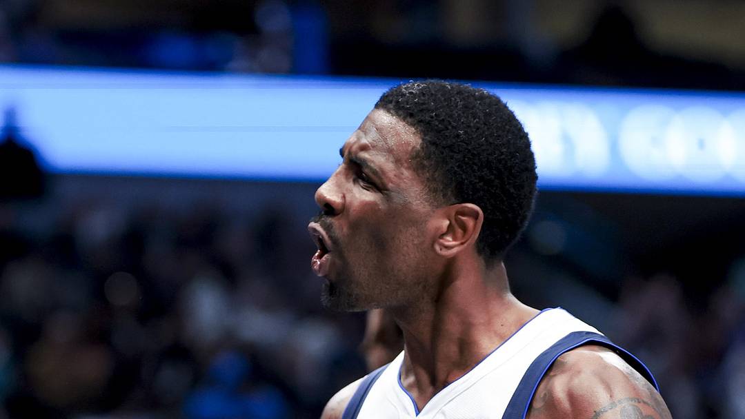 Feb 27, 2025; Dallas, Texas, USA;  Dallas Mavericks guard Kyrie Irving (11) reacts after scoring against the Charlotte Hornets during the second half at American Airlines Center. Mandatory Credit: Kevin Jairaj-Imagn Images