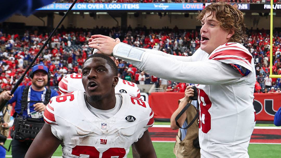 Oct 25, 2026; Houston, Texas, USA; New York Giants running back Devin Singletary (26) and quarterback J.J. McCarthy (18) celebrate after the game against the Houston Texans at Reliant Stadium. Oct 25, 2026; Houston, Texas, USA; New York Giants running back Devin Singletary (26) and quarterback J.J. McCarthy (18) celebrate after the game against the Houston Texans at Reliant Stadium.