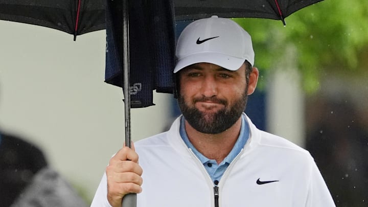 Scottie Scheffler teed off Friday at the PGA Championship less than one hour after being released from jail.