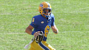 Oct 4, 2025; Pittsburgh, Pennsylvania, USA;  Pittsburgh Panthers quarterback Mason Heintschel (6) scrambles with  the ball against the Boston College Eagles during the fourth quarter at Acrisure Stadium. Mandatory Credit: Charles LeClaire-Imagn Images