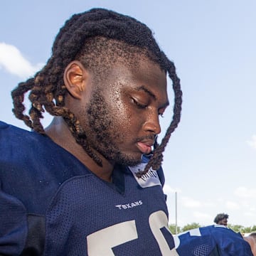 Jul 30, 2023; Houston, TX, USA; Houston Texans guard Kenyon Green (59) signs autographs for fans after training camp practice at the Houston Methodist Training Center. Mandatory Credit: Thomas Shea-Imagn Images