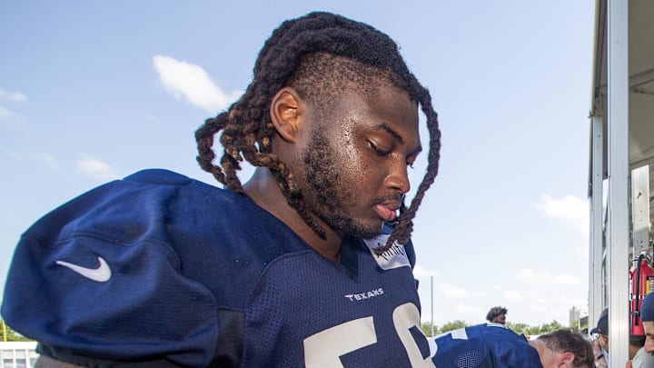 Jul 30, 2023; Houston, TX, USA; Houston Texans guard Kenyon Green (59) signs autographs for fans after training camp practice at the Houston Methodist Training Center. Mandatory Credit: Thomas Shea-Imagn Images