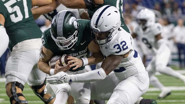 Nov 24, 2023; Detroit, Michigan, USA; Penn State Nittany Lions linebacker Keon Wylie (32) sacks Michigan State Spartans quarterback Katin Houser (12) during the second half at Ford Field. Mandatory Credit: David Reginek-Imagn Images Nov 24, 2023; Detroit, Michigan, USA; Penn State Nittany Lions linebacker Keon Wylie (32) sacks Michigan State Spartans quarterback Katin Houser (12) during the second half at Ford Field. Mandatory Credit: David Reginek-Imagn Images