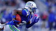 Nov 30, 2025; Seattle, Washington, USA; Seattle Seahawks wide receiver Rashid Shaheed (22) runs the ball during the second half against the Minnesota Vikings at Lumen Field. 