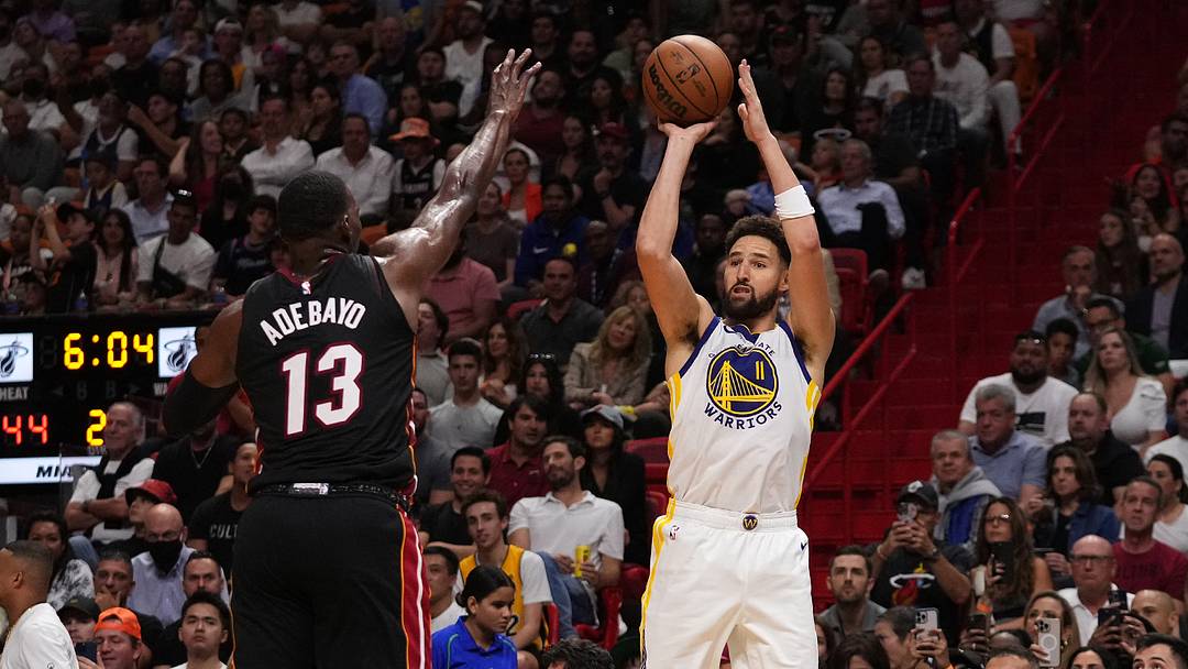 Nov 1, 2022; Miami, Florida, USA; Golden State Warriors guard Klay Thompson (11) attempts a three point shot over Miami Heat center Bam Adebayo (13) during the first half at FTX Arena. Mandatory Credit: Jasen Vinlove-USA TODAY Sports Nov 1, 2022; Miami, Florida, USA; Golden State Warriors guard Klay Thompson (11) attempts a three point shot over Miami Heat center Bam Adebayo (13) during the first half at FTX Arena. Mandatory Credit: Jasen Vinlove-USA TODAY Sports