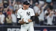 Jun 19, 2024; Bronx, New York, USA;  New York Yankees pitcher Anthony Misiewicz (58) reacts after the third out in the ninth inning against the Baltimore Orioles at Yankee Stadium. Mandatory Credit: Wendell Cruz-Imagn Images