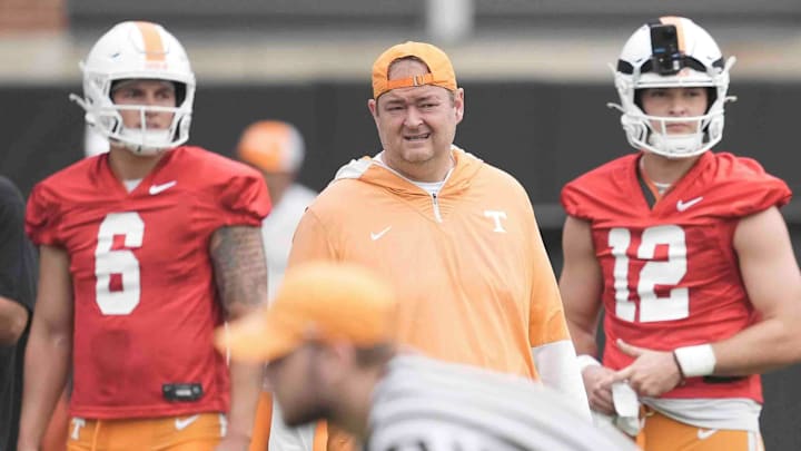 Tennessee quarterback Joey Aguilar (6) Tennessee head coach Josh Heupel and Tennessee quarterback Jake Merklinger (12) during Tennessee football preseason practice, in Knoxville, Tennessee, July 31, 2025.