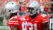 Sep 16, 2017; Columbus, OH, USA; Ohio State Buckeyes wide receiver Parris Campbell (21) celebrates with his teammate Terry McLaurin (83) following his touchdown against the Army Black Knights at Ohio Stadium. Mandatory Credit: Joe Maiorana-USA TODAY Sports