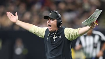 New Orleans Saints head coach Kellen Moore reacts on the sidelines