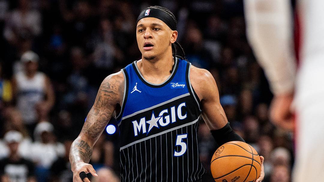 May 1, 2026; Orlando, Florida, USA; Orlando Magic forward Paolo Banchero (5) dribbles the ball against the Detroit Pistons in th fourth quarter during game six of the first round of the 2026 NBA Playoffs at Kia Center. Mandatory Credit: Jeremy Reper-Imagn Images
