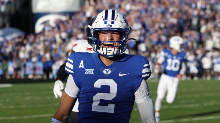 Oct 21, 2023; Provo, Utah, USA; Brigham Young Cougars wide receiver Chase Roberts (2) reacts to scoring a touchdown against the Texas Tech Red Raiders in the first quarter at LaVell Edwards Stadium.