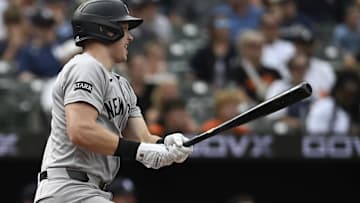 Sep 21, 2025; Baltimore, Maryland, USA;  New York Yankees first base Ben Rice (22) swings through sixth inning rbi single against the Baltimore Orioles at Oriole Park at Camden Yards. Mandatory Credit: Tommy Gilligan-Imagn Images