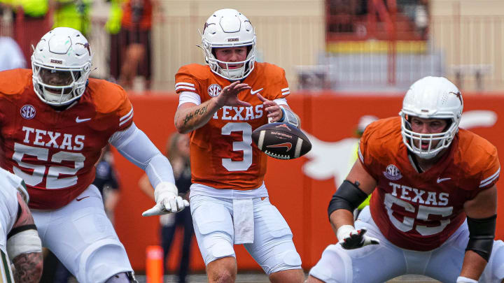 Texas Longhorns quarterback Quinn Ewers receives a snap during the game against Colorado State at Darrell K Royal-Texas Memorial Stadium in Austin Saturday, Aug. 31, 2024.