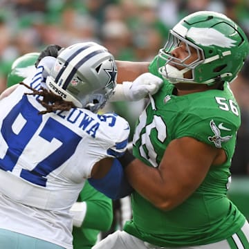 Dec 29, 2024; Philadelphia, Pennsylvania, USA; Philadelphia Eagles guard Tyler Steen (56) blocks Dallas Cowboys defensive tackle Osa Odighizuwa (97) at Lincoln Financial Field. Mandatory Credit: Eric Hartline-Imagn Images