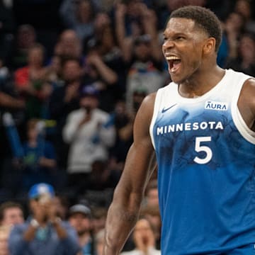 Apr 9, 2024; Minneapolis, Minnesota, USA; Minnesota Timberwolves guard Anthony Edwards (5) celebrates scoring a career high 51 points against the Washington Wizards in the fourth quarter at Target Center. Mandatory Credit: Matt Blewett-Imagn Images