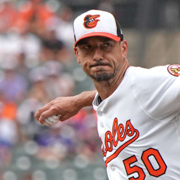 Jul 10, 2025; Baltimore, Maryland, USA;  Baltimore Orioles pitcher Charlie Morton (50) delivers in the first inning  against the New York Mets  at Oriole Park at Camden Yards. Mandatory Credit: Mitch Stringer-Imagn Images