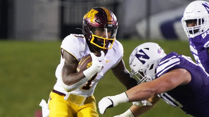 Sep 23, 2023; Evanston, Illinois, USA; Minnesota Golden Gophers running back Darius Taylor (1) runs against the Northwestern Wildcats during the first quarter at Ryan Field. Mandatory Credit: David Banks-USA TODAY Sports