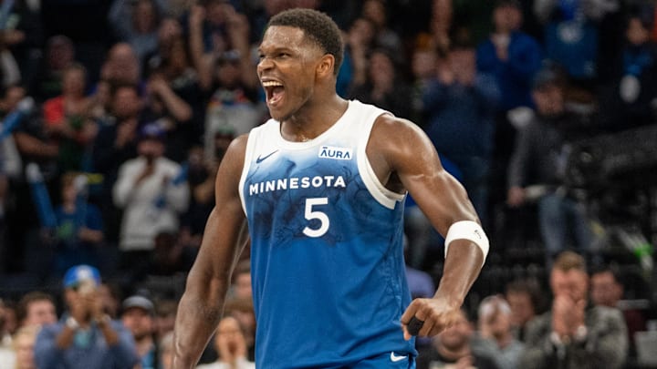 Apr 9, 2024; Minneapolis, Minnesota, USA; Minnesota Timberwolves guard Anthony Edwards (5) celebrates scoring a career high 51 points against the Washington Wizards in the fourth quarter at Target Center. Mandatory Credit: Matt Blewett-Imagn Images