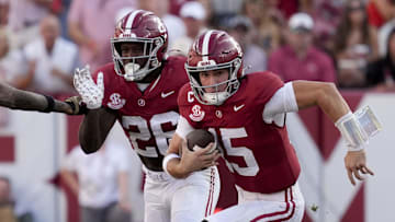 Alabama quarterback Ty Simpson (15) runs the ball after being forced out of the pocket by the Vanderbilt rush at Saban Field at Bryant-Denny Stadium. Alabama downed Vanderbilt 30-14. Credit: Gary Cosby Jr.-Imagn Images