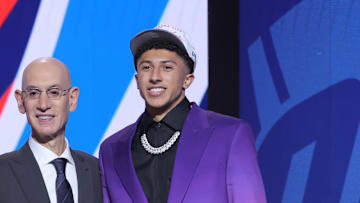 Jun 25, 2025; Brooklyn, NY, USA;  Nique Clifford stands with NBA commissioner Adam Silver after being selected as the 24th pick by the Oklahoma City Thunder in the first round of the 2025 NBA Draft at Barclays Center. Mandatory Credit: Brad Penner-Imagn Images