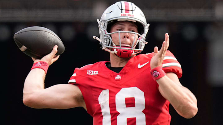 Aug 31, 2024; Columbus, OH, USA; Ohio State Buckeyes quarterback Will Howard (18) throws during the NCAA football game against the Akron Zips at Ohio Stadium. Ohio State won 52-6.