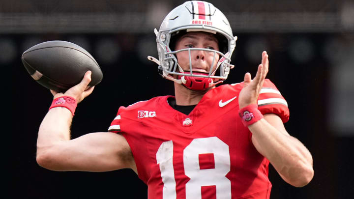 Aug 31, 2024; Columbus, OH, USA; Ohio State Buckeyes quarterback Will Howard (18) throws during the NCAA football game against the Akron Zips at Ohio Stadium. Ohio State won 52-6.