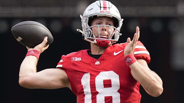 Aug 31, 2024; Columbus, OH, USA; Ohio State Buckeyes quarterback Will Howard (18) throws during the NCAA football game against the Akron Zips at Ohio Stadium. Ohio State won 52-6.