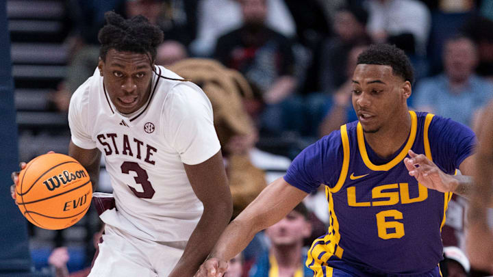 Mississippi State Bulldogs forward KeShawn Murphy (3) dribbles up court against LSU Tigers forward Robert Miller III (6) during their first round game of the SEC Men's Basketball Tournament at Bridgestone Arena in Nashville, Tenn., Wednesday, March 12, 2025.