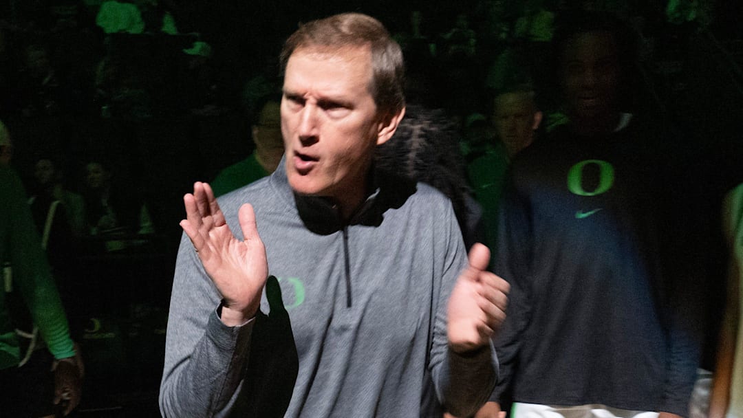 Oregon coach Dana Altman brings his team together before their game against Troy at Matthew Knight Arena in Eugene.