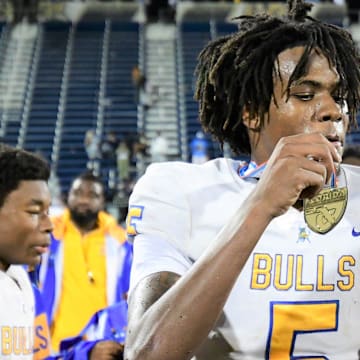 Miami Northwestern's Calvin "GUMP" Russell III a 5-star wide receiver, has committed to Syracuse University.