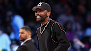 Mar 24, 2025; Brooklyn, New York, USA; Dallas Mavericks guard Kyrie Irving (11) looks on during the first quarter against the Brooklyn Nets at Barclays Center. Mandatory Credit: Vincent Carchietta-Imagn Images