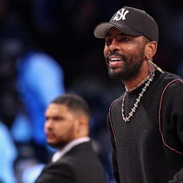 Mar 24, 2025; Brooklyn, New York, USA; Dallas Mavericks guard Kyrie Irving (11) looks on during the first quarter against the Brooklyn Nets at Barclays Center. Mandatory Credit: Vincent Carchietta-Imagn Images