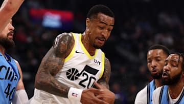 Nov 17, 2024; Inglewood, California, USA;  Utah Jazz forward John Collins (20) loses the ball while driving to the basket during the first quarter against the Los Angeles Clippers at Intuit Dome. Mandatory Credit: Kiyoshi Mio-Imagn Images