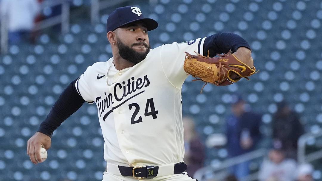 May 13, 2026; Minneapolis, Minnesota, USA; Minnesota Twins pitcher Simeon Woods Richardson (24) throws to the Miami Marlins in the first inning at Target Field. Mandatory Credit: Bruce Kluckhohn-Imagn Images