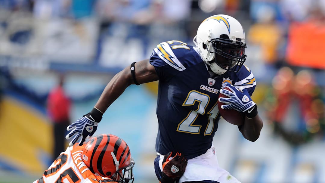 December 20, 2009; San Diego, CA, USA; San Diego Chargers running back LaDainian Tomlinson (21) runs for a short gain during the first quarter against the Cincinnati Bengals at Qualcomm Stadium.  Mandatory Credit: Christopher Hanewinckel-Imagn Images
