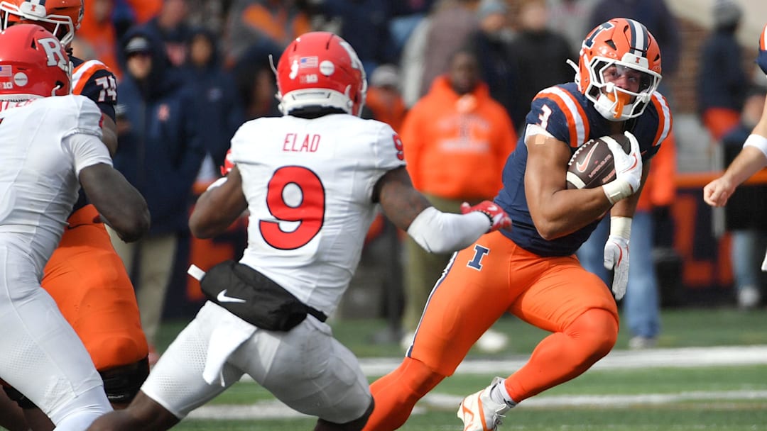 Nov 1, 2025; Champaign, Illinois, USA; Illinois Fighting Illini running back Kaden Feagin (3) is pursued by Rutgers Scarlet Knights defensive back Jett Elad (9) during the second half at Memorial Stadium. Mandatory Credit: Ron Johnson-Imagn Images Nov 1, 2025; Champaign, Illinois, USA; Illinois Fighting Illini running back Kaden Feagin (3) is pursued by Rutgers Scarlet Knights defensive back Jett Elad (9) during the second half at Memorial Stadium. Mandatory Credit: Ron Johnson-Imagn Images