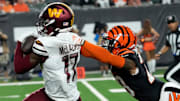 Washington Commanders wide receiver Terry McLaurin (17) runs toward the end zone as Cincinnati Bengals cornerback Cam Taylor-Britt (29) makes the tackle in the 2nd quarter Monday, September 23, 2024 at Paycor Stadium.