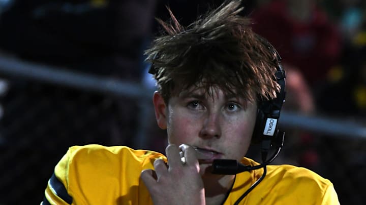 Moeller quarterback Matt Ponatoski, recently named Ohio Mr. Football and Gatorade Football Player of the Year, can often be seen wearing a headset as he is in the regional semifinal game with Princeton Nov. 15, 2024.