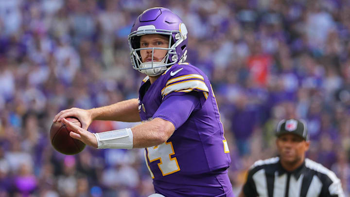 Sep 22, 2024; Minneapolis, Minnesota, USA; Minnesota Vikings quarterback Sam Darnold (14) throws a pass for a touchdown against the Houston Texans in the first quarter at U.S. Bank Stadium. Mandatory Credit: Brad Rempel-Imagn Images Sep 22, 2024; Minneapolis, Minnesota, USA; Minnesota Vikings quarterback Sam Darnold (14) throws a pass for a touchdown against the Houston Texans in the first quarter at U.S. Bank Stadium. Mandatory Credit: Brad Rempel-Imagn Images