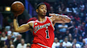 Mar 7, 2016; Chicago, IL, USA; Chicago Bulls guard Derrick Rose (1) looks to make a pass during the second half of the game against the Milwaukee Bucks at United Center. Mandatory Credit: Caylor Arnold-Imagn Images