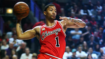 Mar 7, 2016; Chicago, IL, USA; Chicago Bulls guard Derrick Rose (1) looks to make a pass during the second half of the game against the Milwaukee Bucks at United Center. Mandatory Credit: Caylor Arnold-Imagn Images