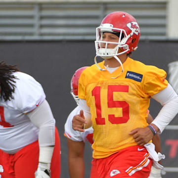 Jun 13, 2017; Kansas City, MO, USA; Kansas City Chiefs quarterback Tyler Bray (9) and quarterback Patrick Mahomes II (15) run drills during the mini camp at University of Kansas Health System Training Complex. Mandatory Credit: Denny Medley-Imagn Images