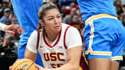 USC Trojans guard Talia von Oelhoffen (55) looks to pass while being guarded by UCLA Bruins center Lauren Betts (51) and forward Janiah Barker (0) during the second half of the 2025 TIAA Big Ten Women's Basketball Tournament final game on Sunday, March 9, 2025, at Gainbridge Fieldhouse in Indianapolis. UCLA defeated USC 72-67.