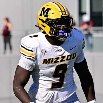 Oct 12, 2024; Amherst, Massachusetts, USA; Missouri Tigers defensive end Zion Young (9) lines up against the Massachusetts Minutemen  during the second half at Warren McGuirk Alumni Stadium. Mandatory Credit: Eric Canha-Imagn Images