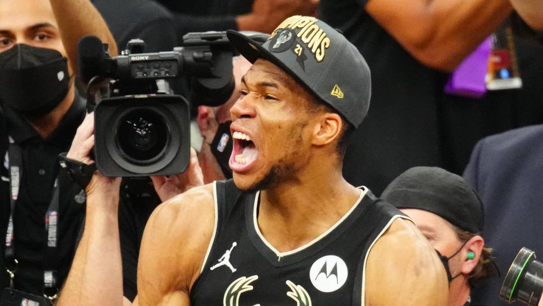 Jul 20, 2021; Milwaukee, Wisconsin, USA; Milwaukee Bucks forward Giannis Antetokounmpo (34) celebrates after winning game six of the 2021 NBA Finals and the championship against the Phoenix Suns at Fiserv Forum. Mandatory Credit: Mark J. Rebilas-Imagn Images Jul 20, 2021; Milwaukee, Wisconsin, USA; Milwaukee Bucks forward Giannis Antetokounmpo (34) celebrates after winning game six of the 2021 NBA Finals and the championship against the Phoenix Suns at Fiserv Forum. Mandatory Credit: Mark J. Rebilas-Imagn Images